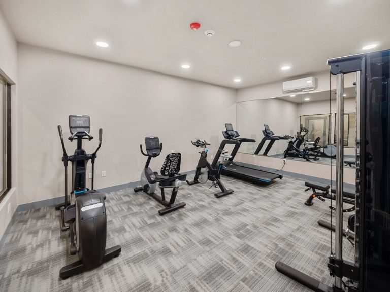 The Retreat at 5-Mile - Spokane Apartment Rentals - weight room